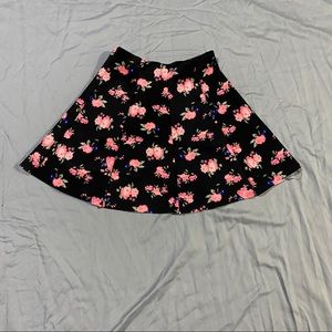 Black and floral mini skirt